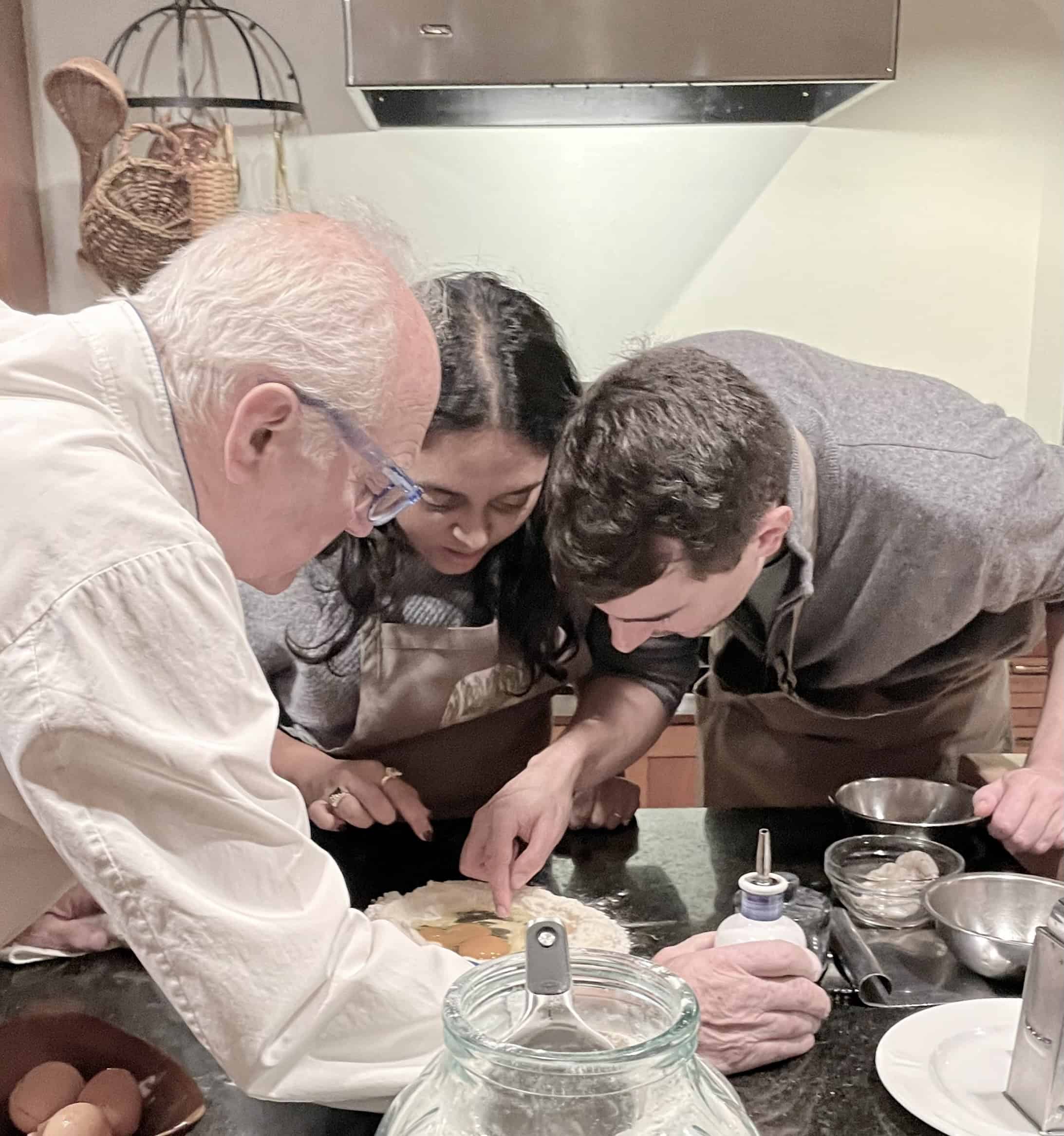 Cooking class with diverse participants at Odyssey Events.