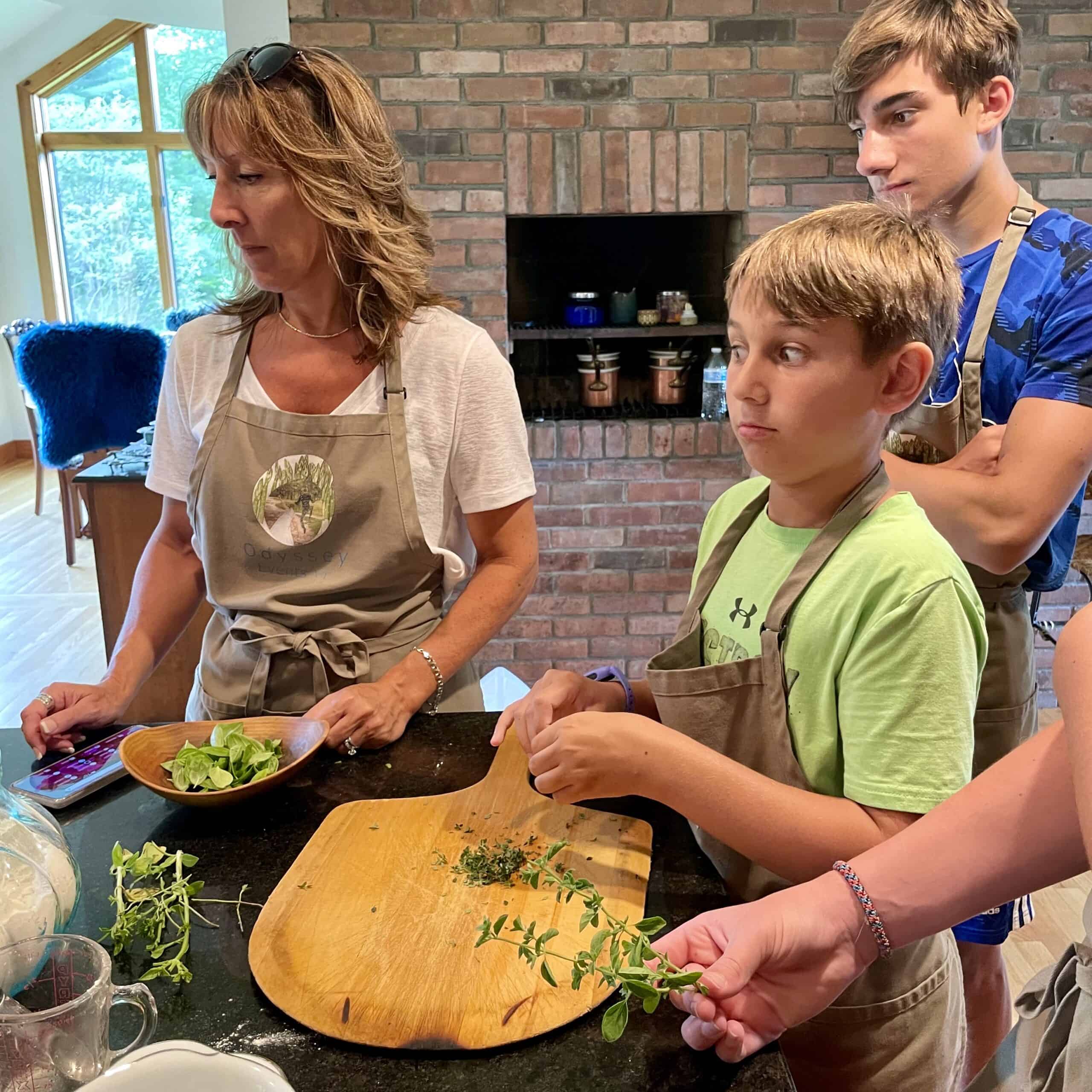 Family cooking class with kids and adults at Odyssey Events kitchen.