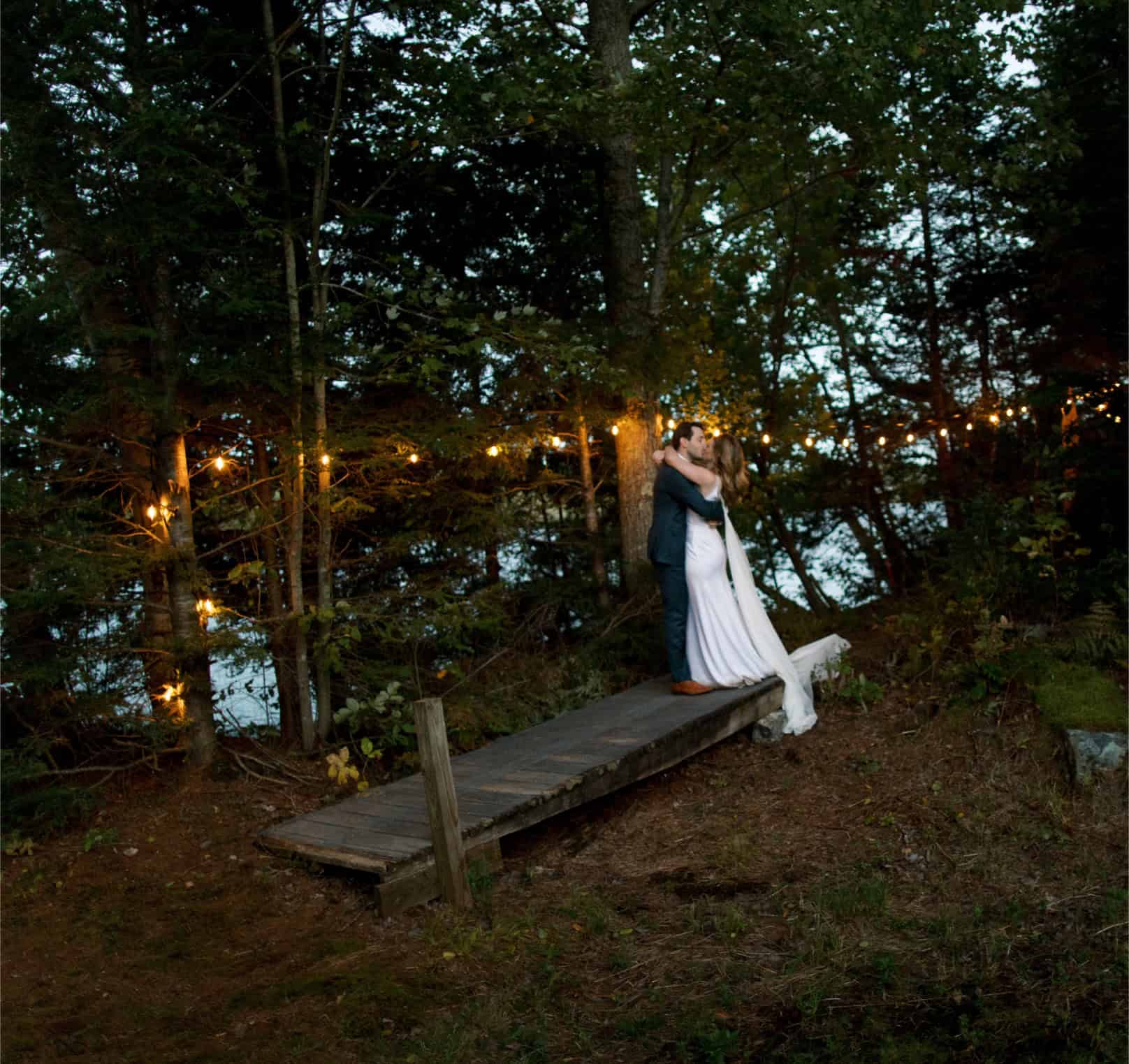Elegant wedding photo capturing romantic moment outdoors.