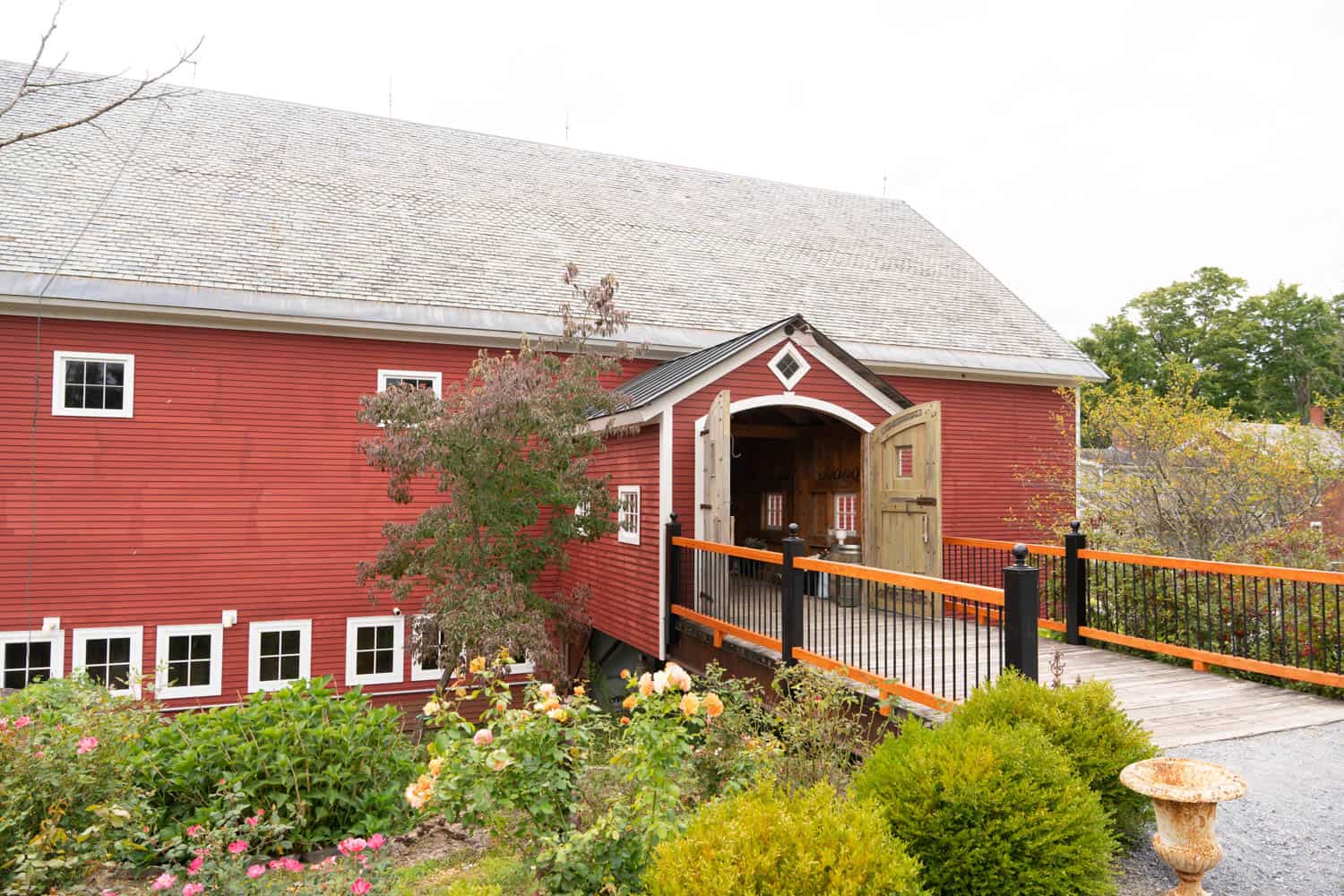 Barn wedding venue with rustic charm and scenic garden views.