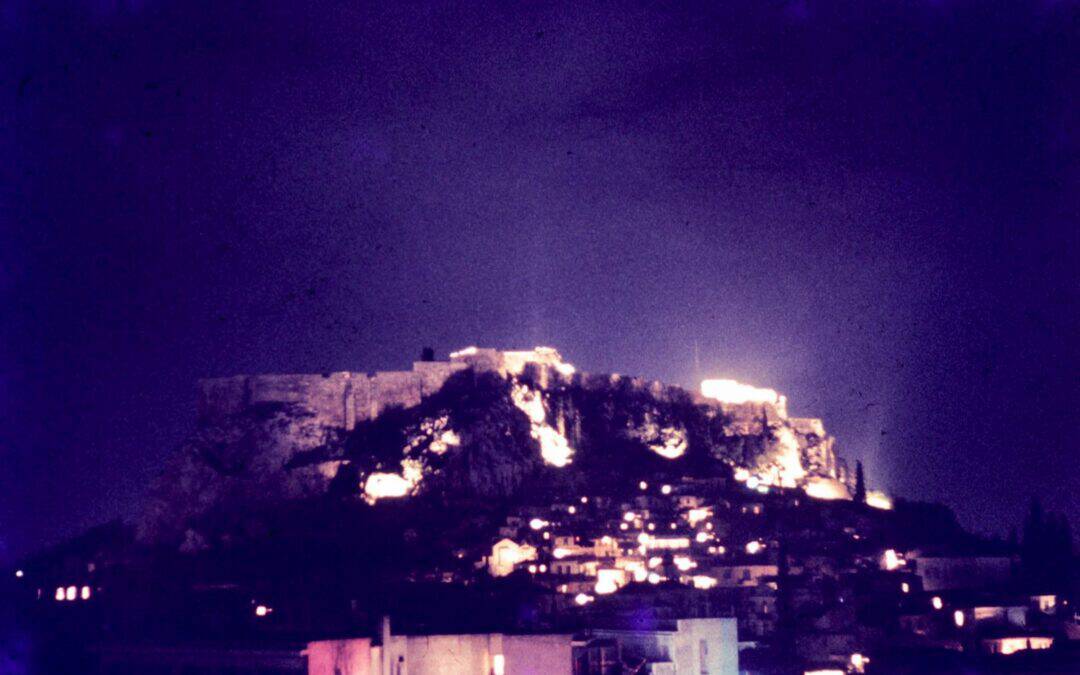 Night view of the Acropolis illuminated in Athens, Greece, perfect for elegant event settings.